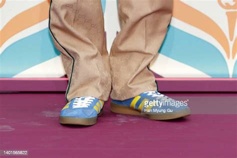 Jay B, shoe detail, of Boy band GOT7 attends the 'GUCCI X 